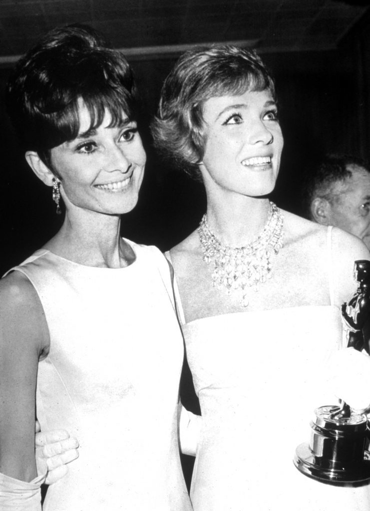 Audrey Hepburn and Julie Andrews pose for a pic at 1965 Oscars