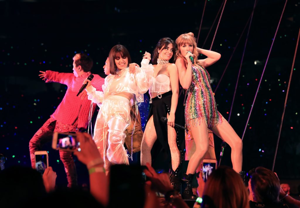For the final outfit change on her Reputation Tour, Taylor Swift wears a sparkly rainbow playsuit. 